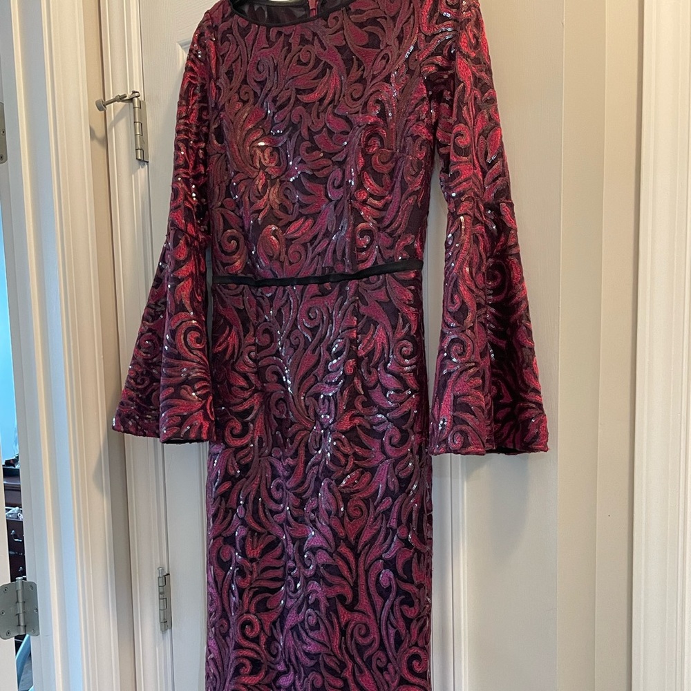 Long, formal dress with red and black sequences Carmen Marc Valo